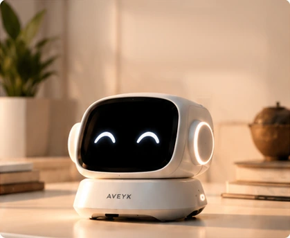 Concept render of the AVEYK Desktop Robot on a desk beside books and a plant, in warm evening light.